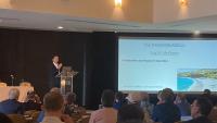 Dr. Guy M. McKhann delivering the NSA Presidential Address to attendees.
